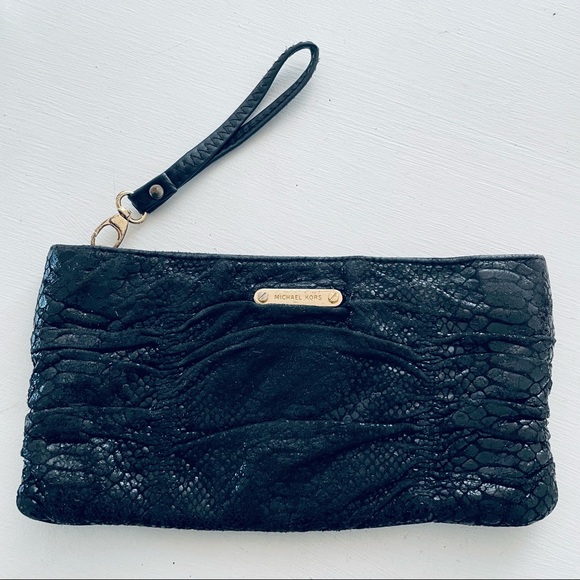 Michael Kors Black
Python Embossed
Leather Clutch - Picture 10 of 10